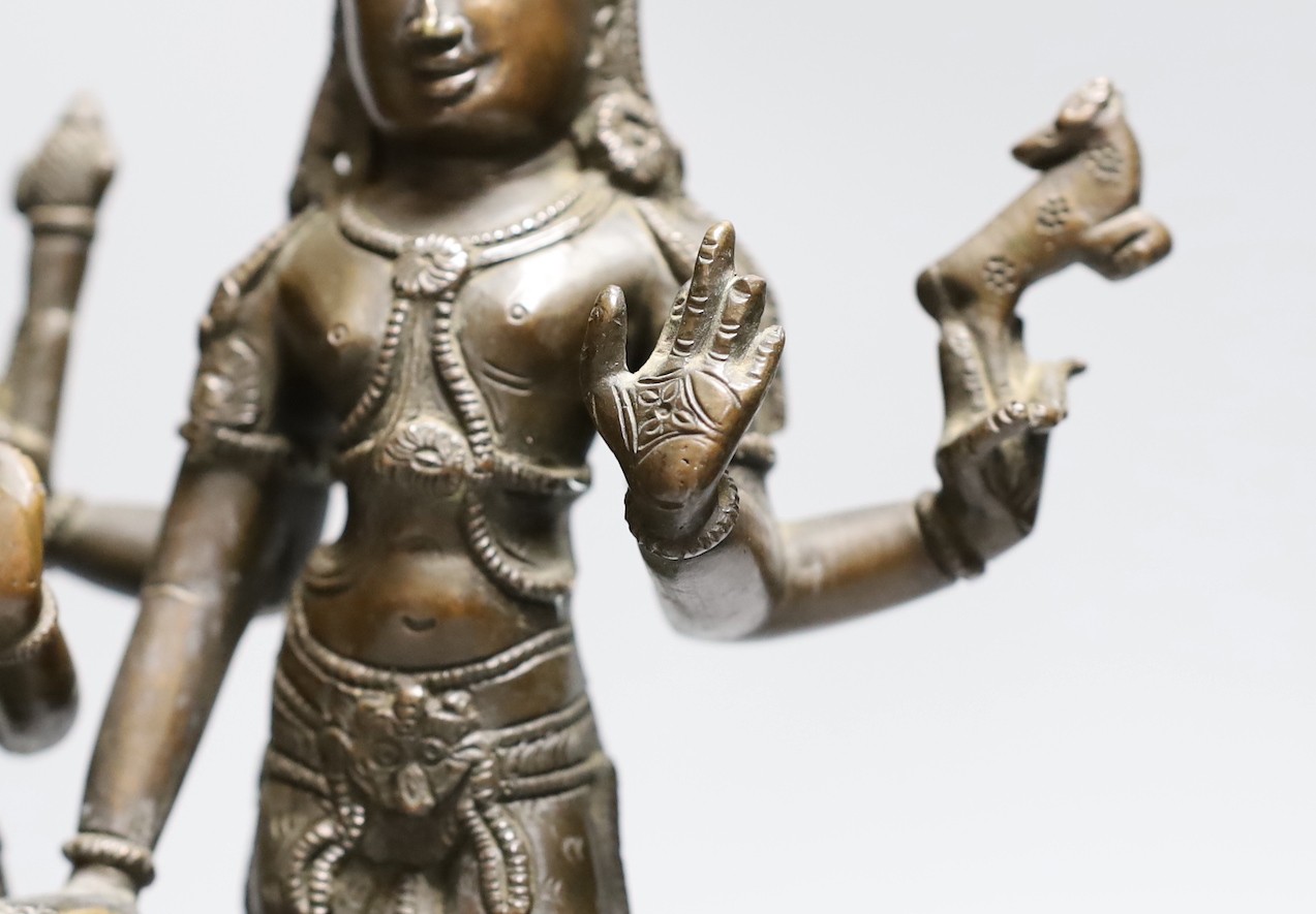 An Indian bronze group Shiva and Pavarti, early 20th century, 33cms high